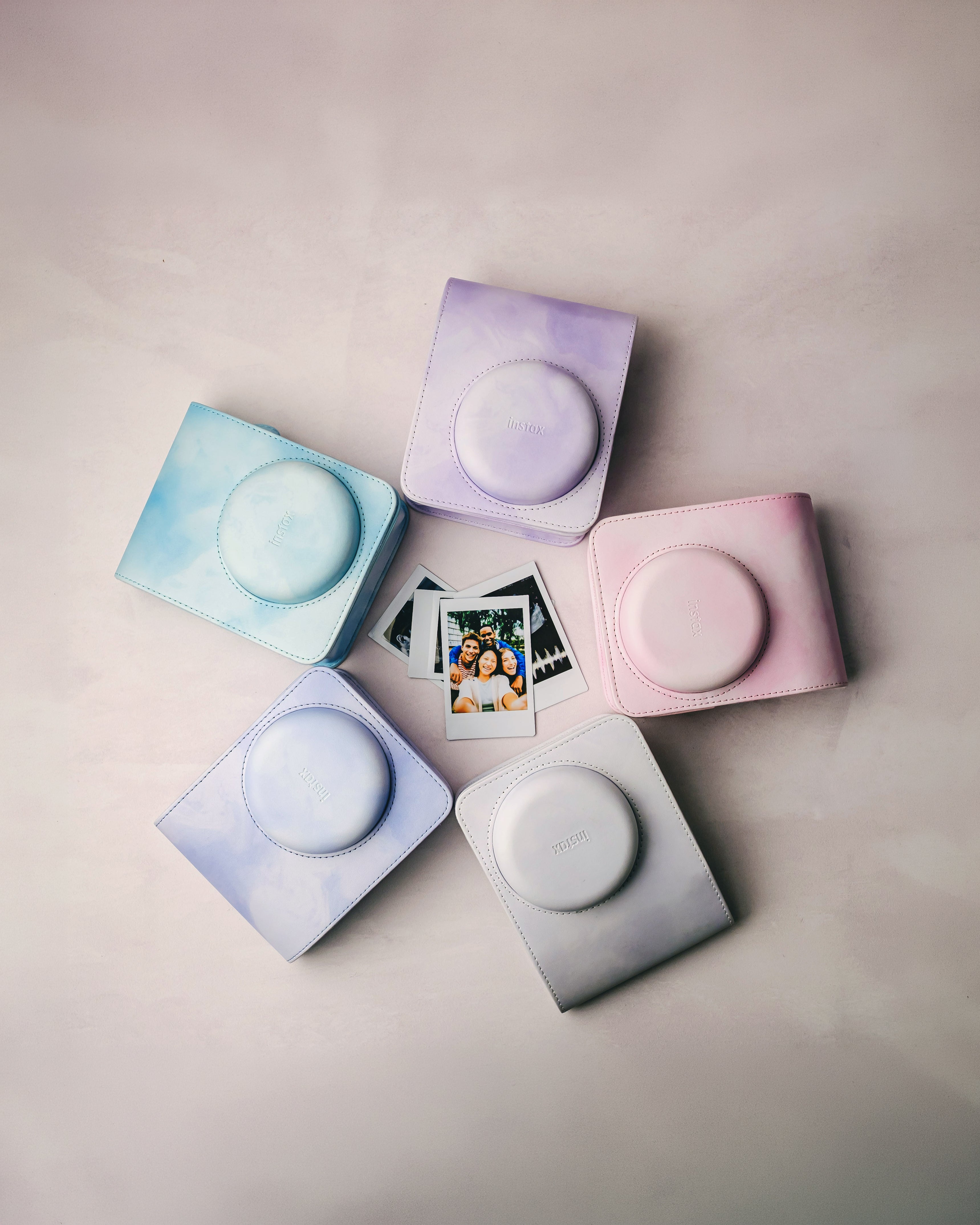 Kit Câmera instantânea Fujifilm instax mini 13™ Lagoon Green + Pack 10 fotos Pastel Galaxy + Bolsa Green Tie Dye + Photo tag